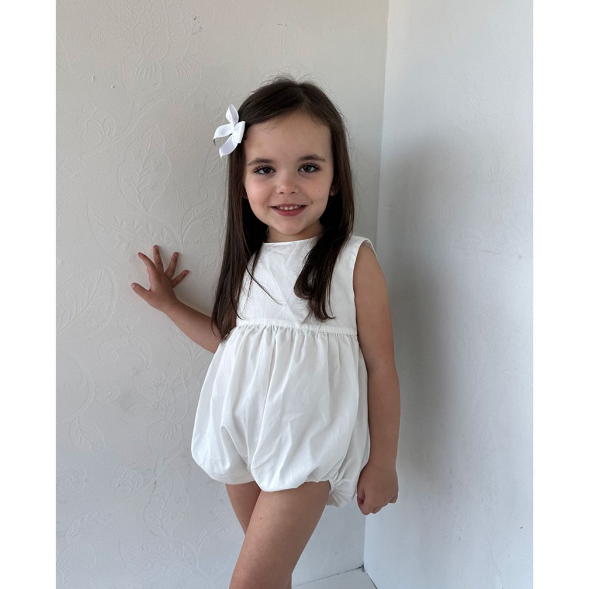 Picture of Phi White Romper with Black Bow